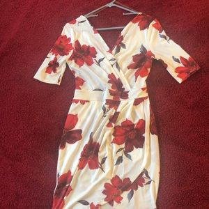 Super sexy mini red flower dress cross design in the front.